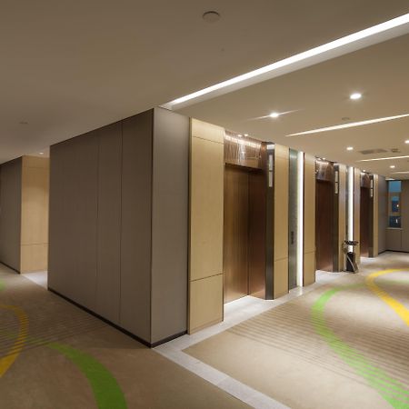 Hai Tian Expo Hotel Циндао Экстерьер фото