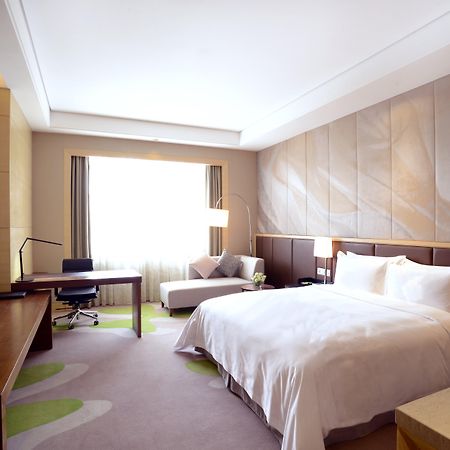 Hai Tian Expo Hotel Циндао Экстерьер фото