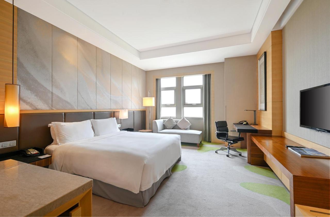 Hai Tian Expo Hotel Циндао Экстерьер фото