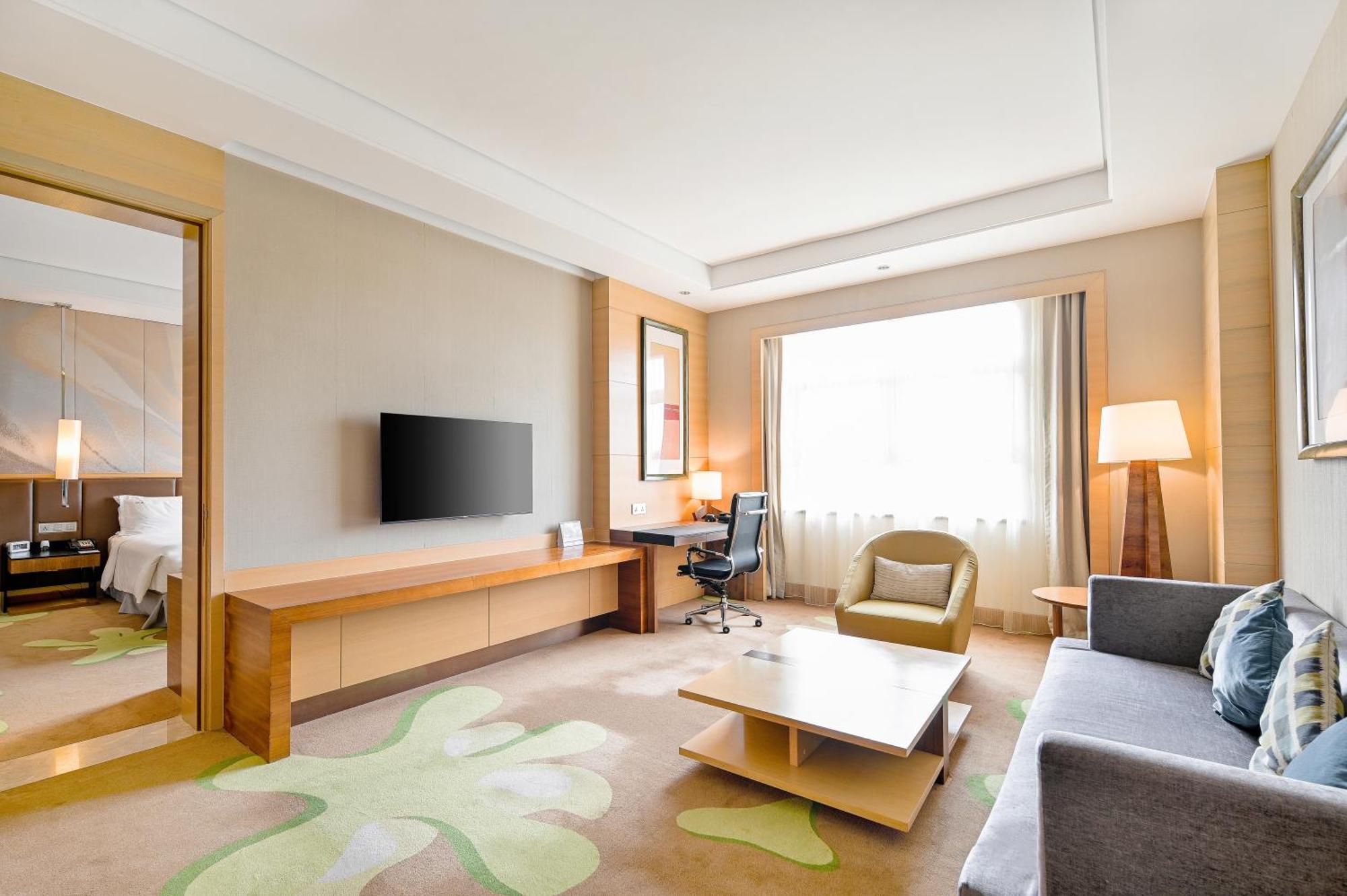 Hai Tian Expo Hotel Циндао Экстерьер фото